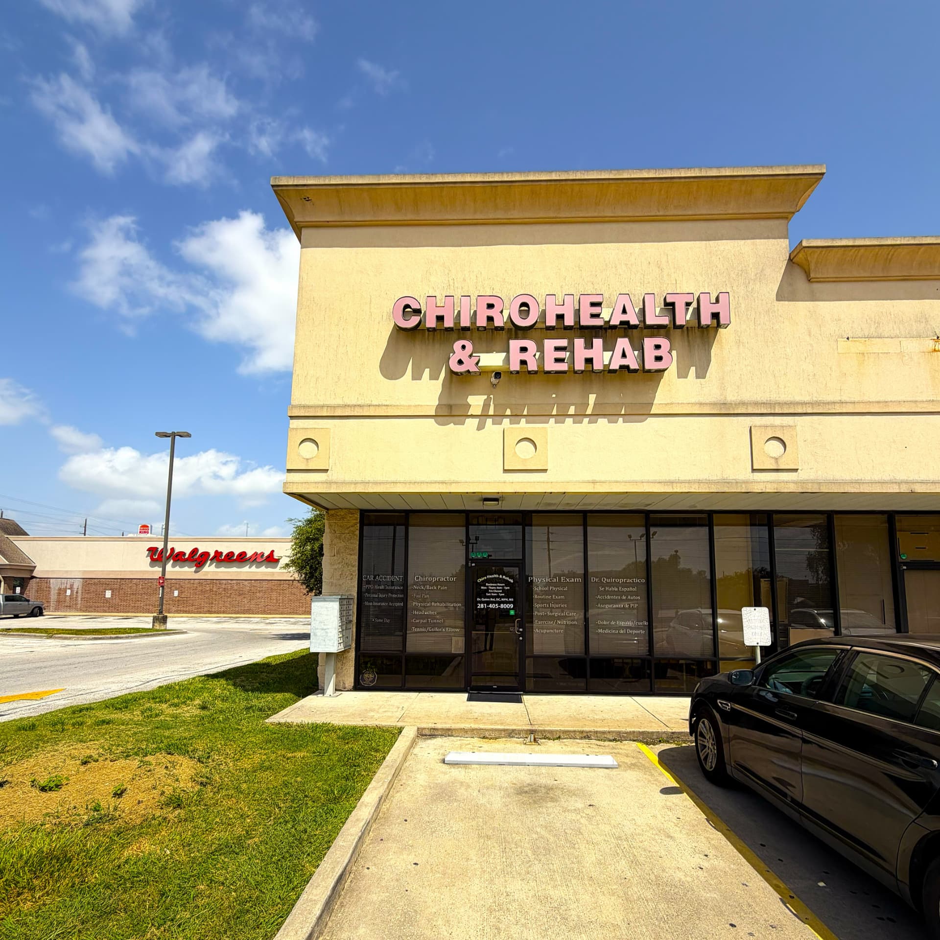 Storefront of Chirohealth & Rehab LLC on Bammel N. Houston Rd with pink channel-letter signage, next to a Walgreens
